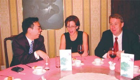 Andy Yang (IAAust Council member), Helen Martin (IAAust President), Michael Ross (President of the Actuarial Society of Hong Kong) - 2002